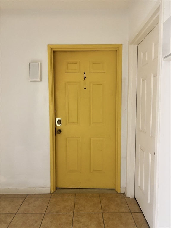 a view of a hallway with closet area
