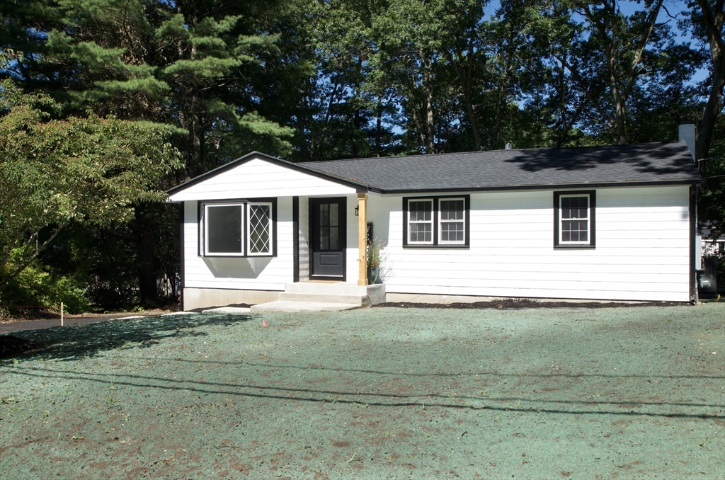 7 Barbara Road Kingston, MA 02364 - Photo 23 of 26 a white house that has a tree in front of it