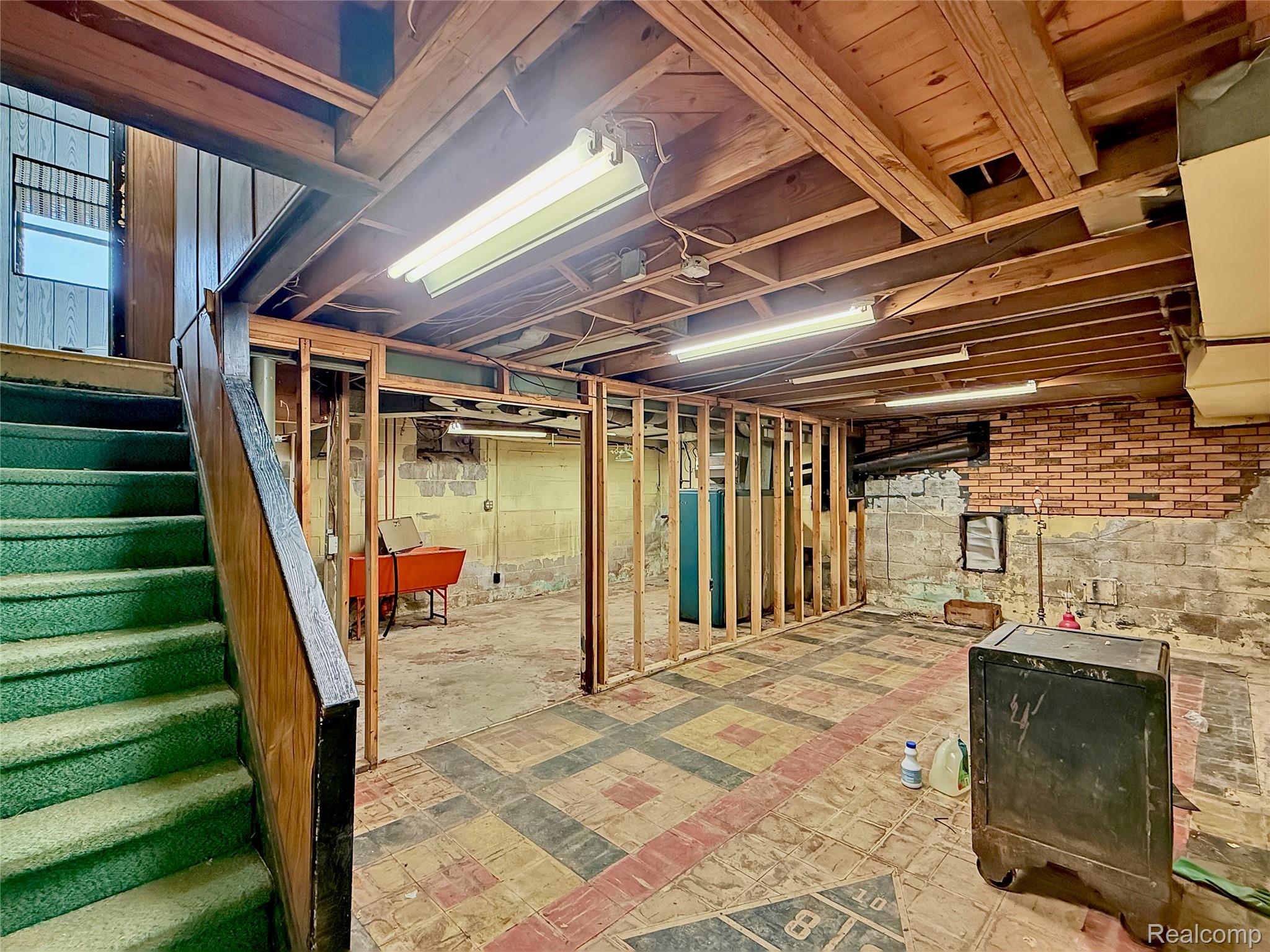 768 Washington Road Grosse Pointe, MI 48230 - Photo 25 of 54 Unfinished below grade area featuring stairway