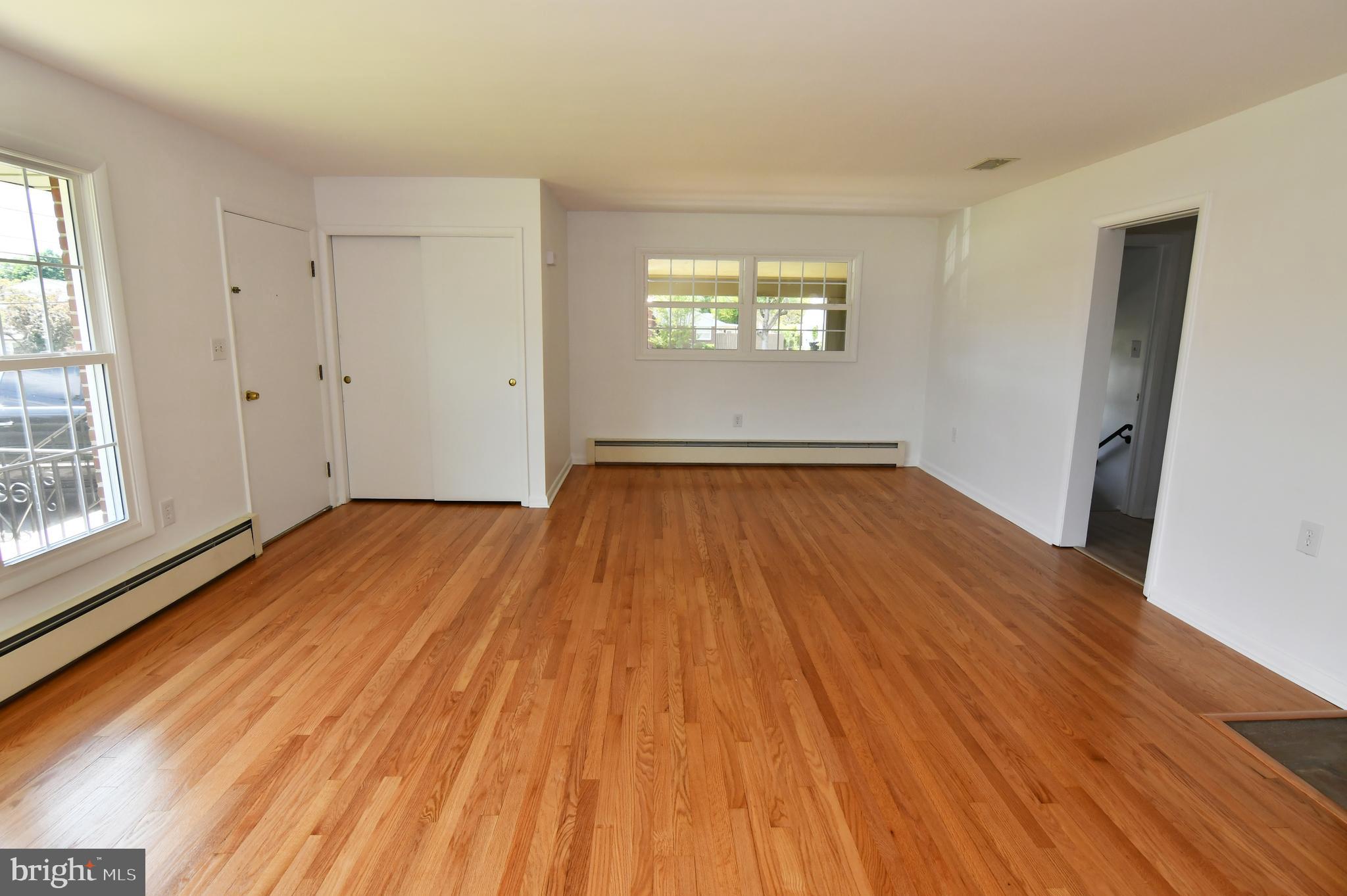 437 Beechcroft Road Winchester, VA 22601 - Photo 14 of 52 wooden floor in an empty room with a window
