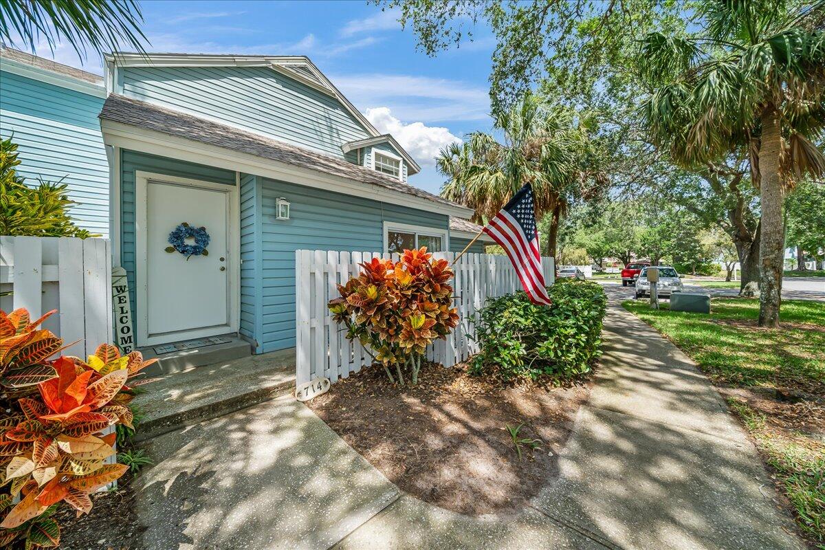 714 Players Court Melbourne, FL 32940 - Photo 1 of 23 a front view of a house with a yard
