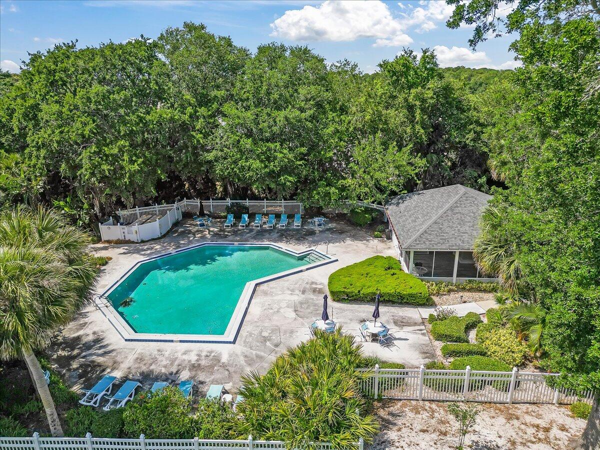 714 Players Court Melbourne, FL 32940 - Photo 21 of 23 an aerial view of a house with outdoor space patio and swimming pool