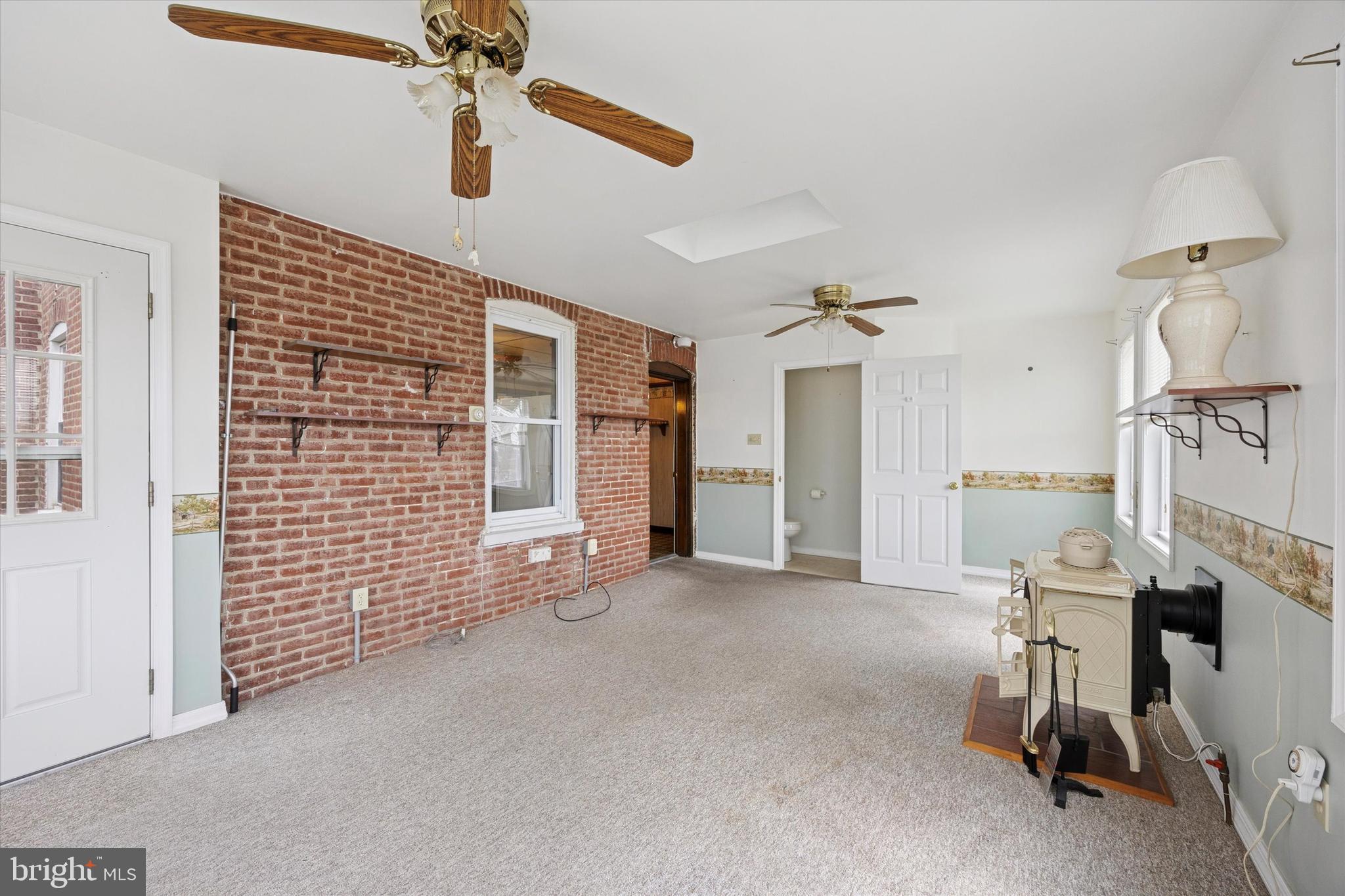 320 Chestnut Street Spring City, PA 19475 - Photo 6 of 14 a view of a livingroom with a furniture and windows