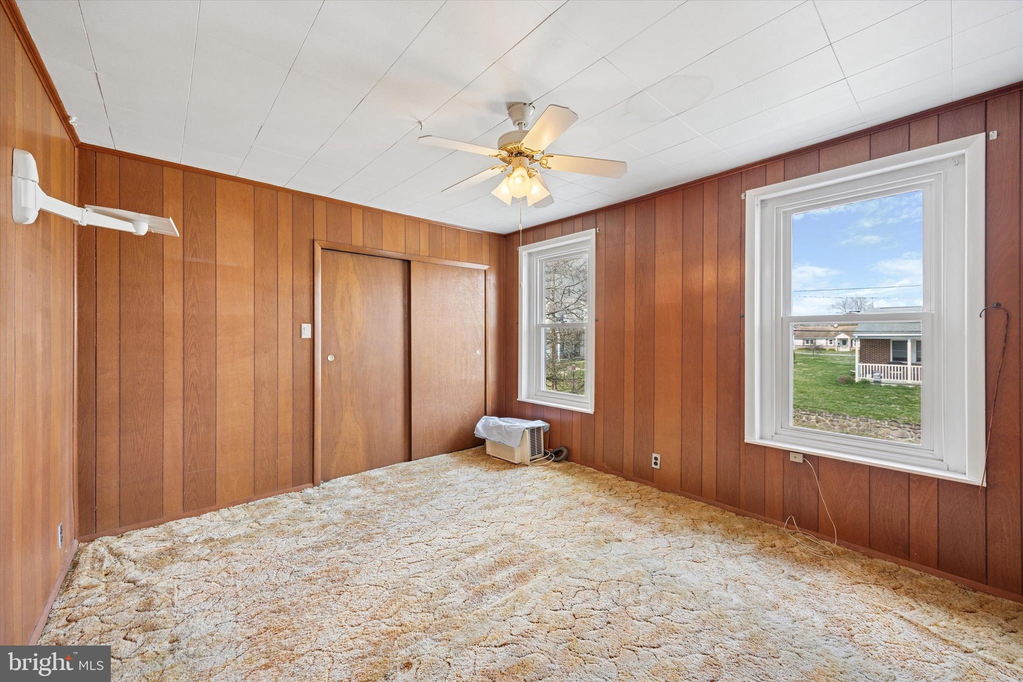 320 Chestnut Street Spring City, PA 19475 - Photo 8 of 14 a bedroom with a bed and a chandelier