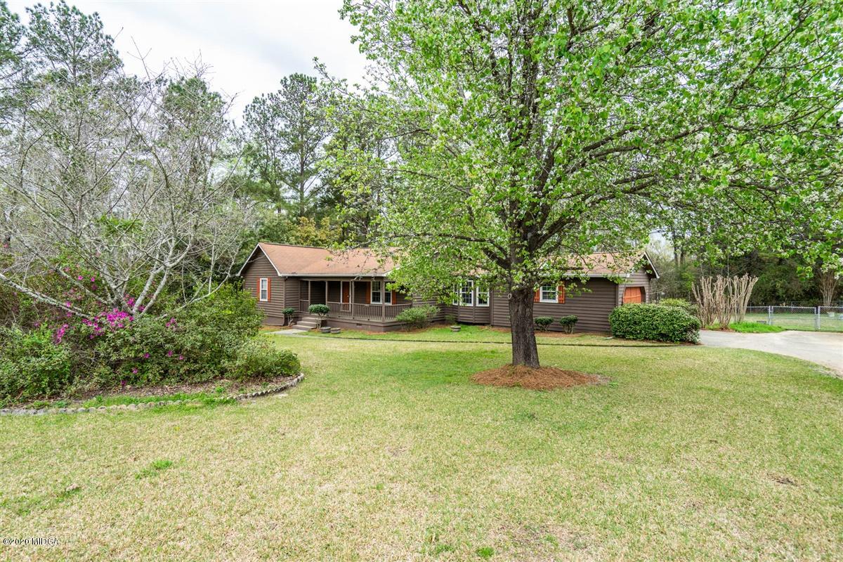 6345 Stapleton Road Macon, GA 31206 - Photo 2 of 21 a tree in the garden of a house