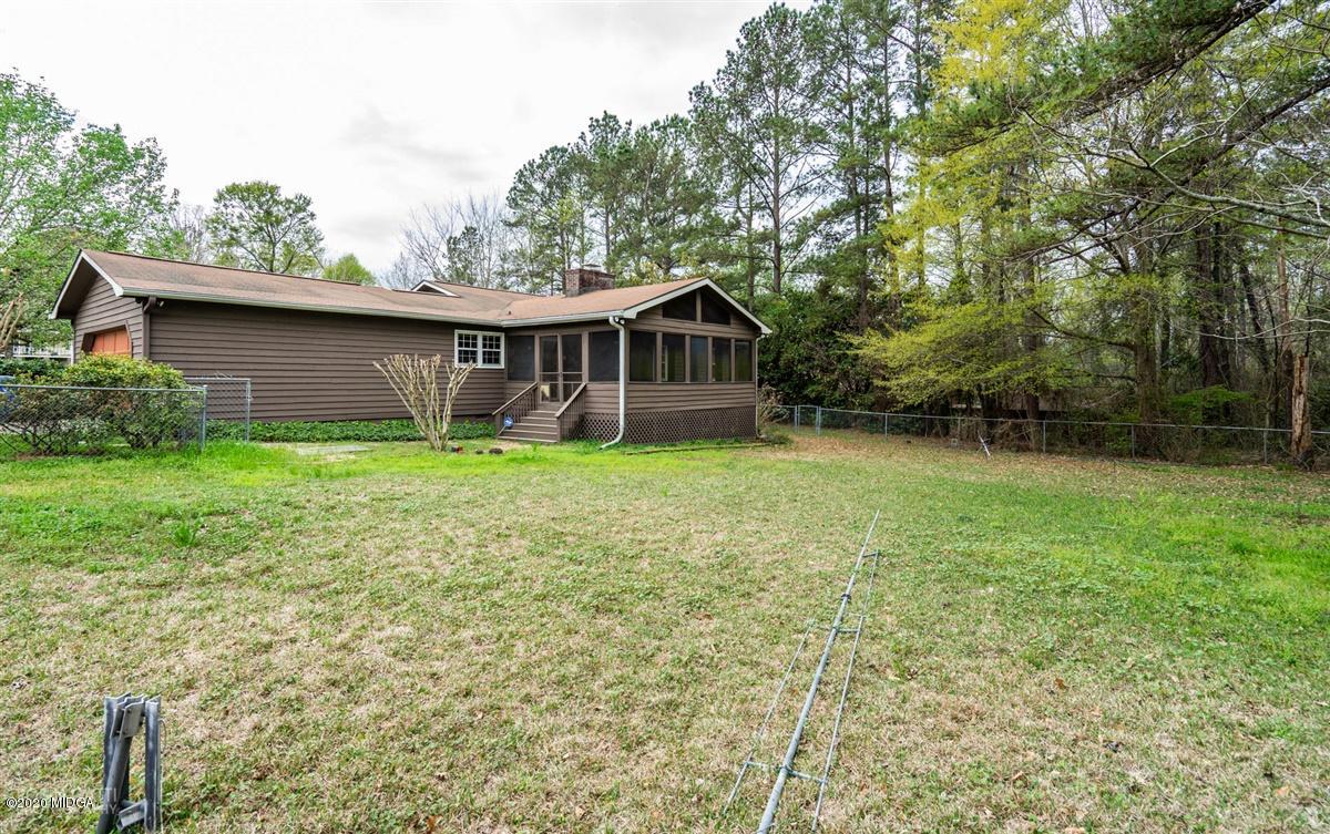 6345 Stapleton Road Macon, GA 31206 - Photo 19 of 21 a view of a house with a yard and fence