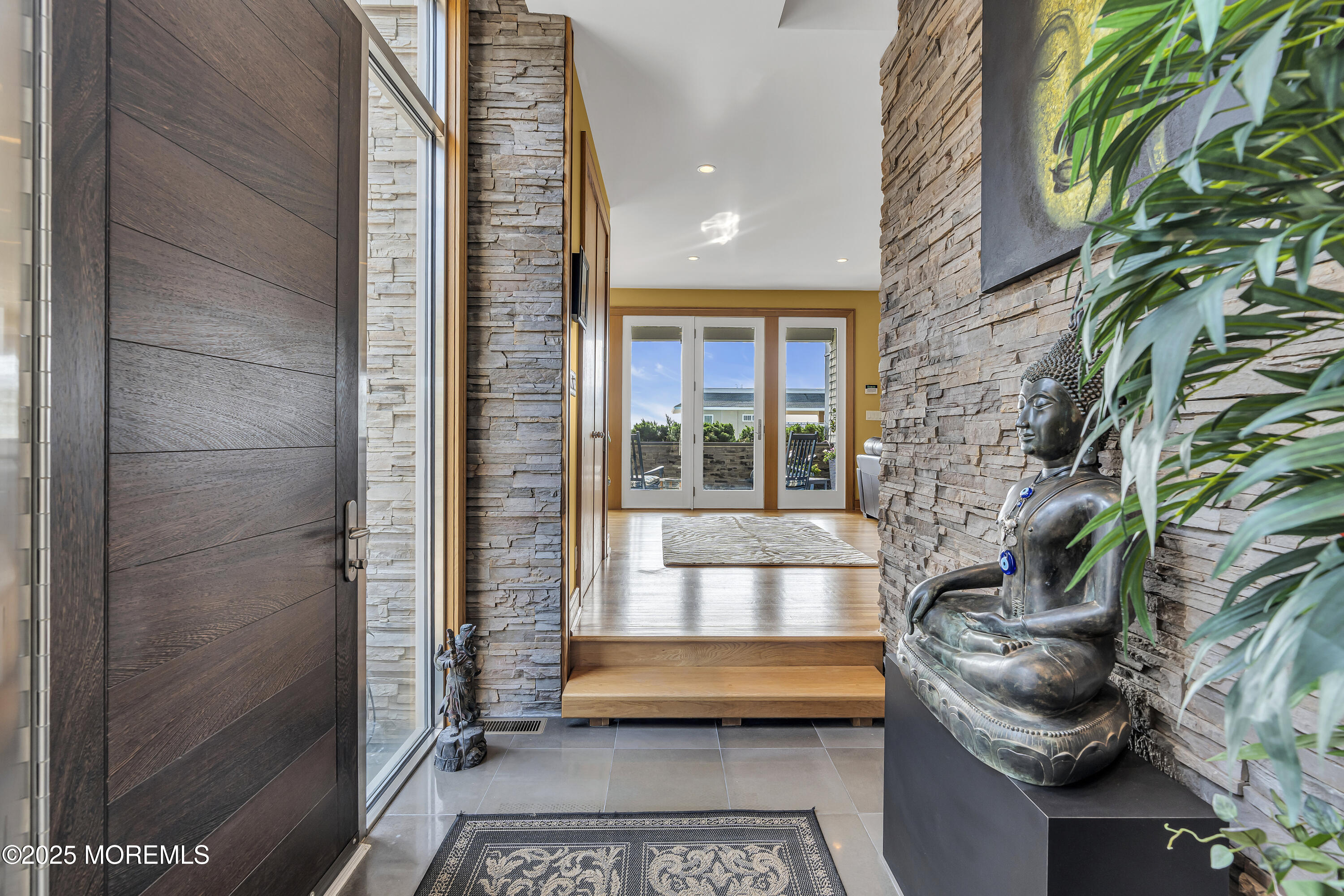 2009 North Ocean Avenue Spring Lake, NJ 07762 - Photo 19 of 91 a outdoor space with sliding door and wooden floor