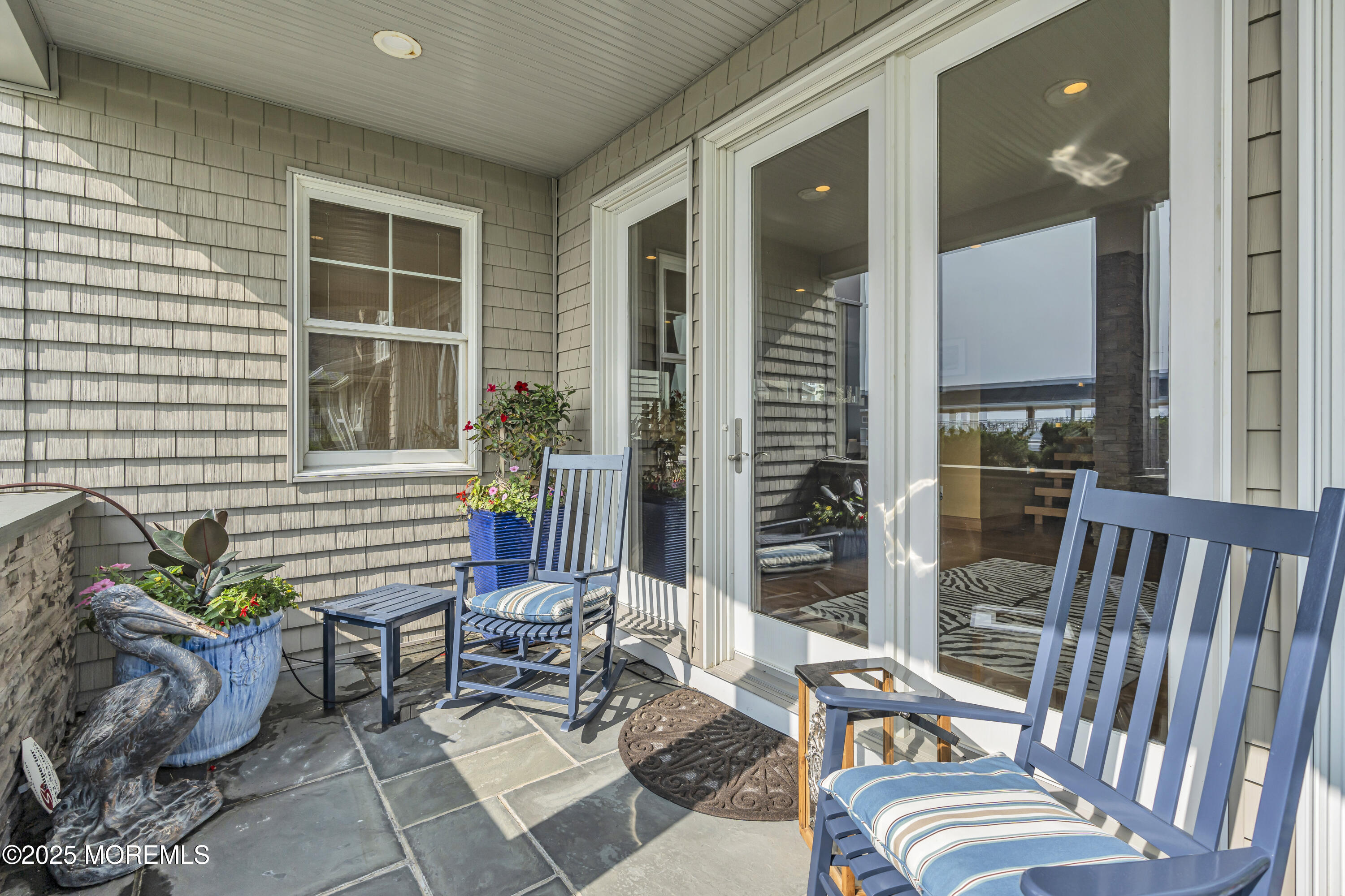 2009 North Ocean Avenue Spring Lake, NJ 07762 - Photo 19 of 91 a outdoor living space with furniture and a potted plant