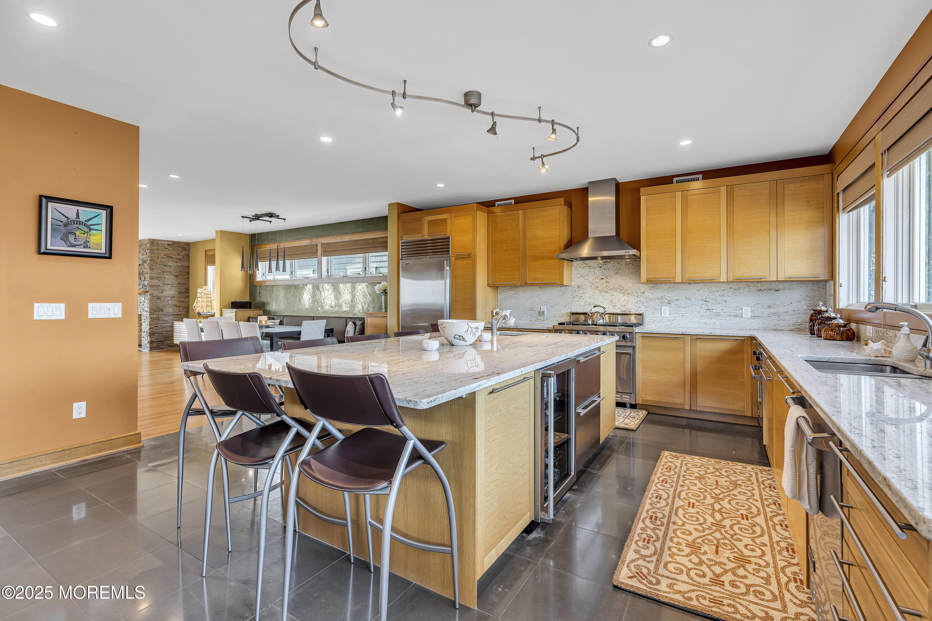 2009 North Ocean Avenue Spring Lake, NJ 07762 - Photo 26 of 91 a kitchen with a table chairs sink and cabinets