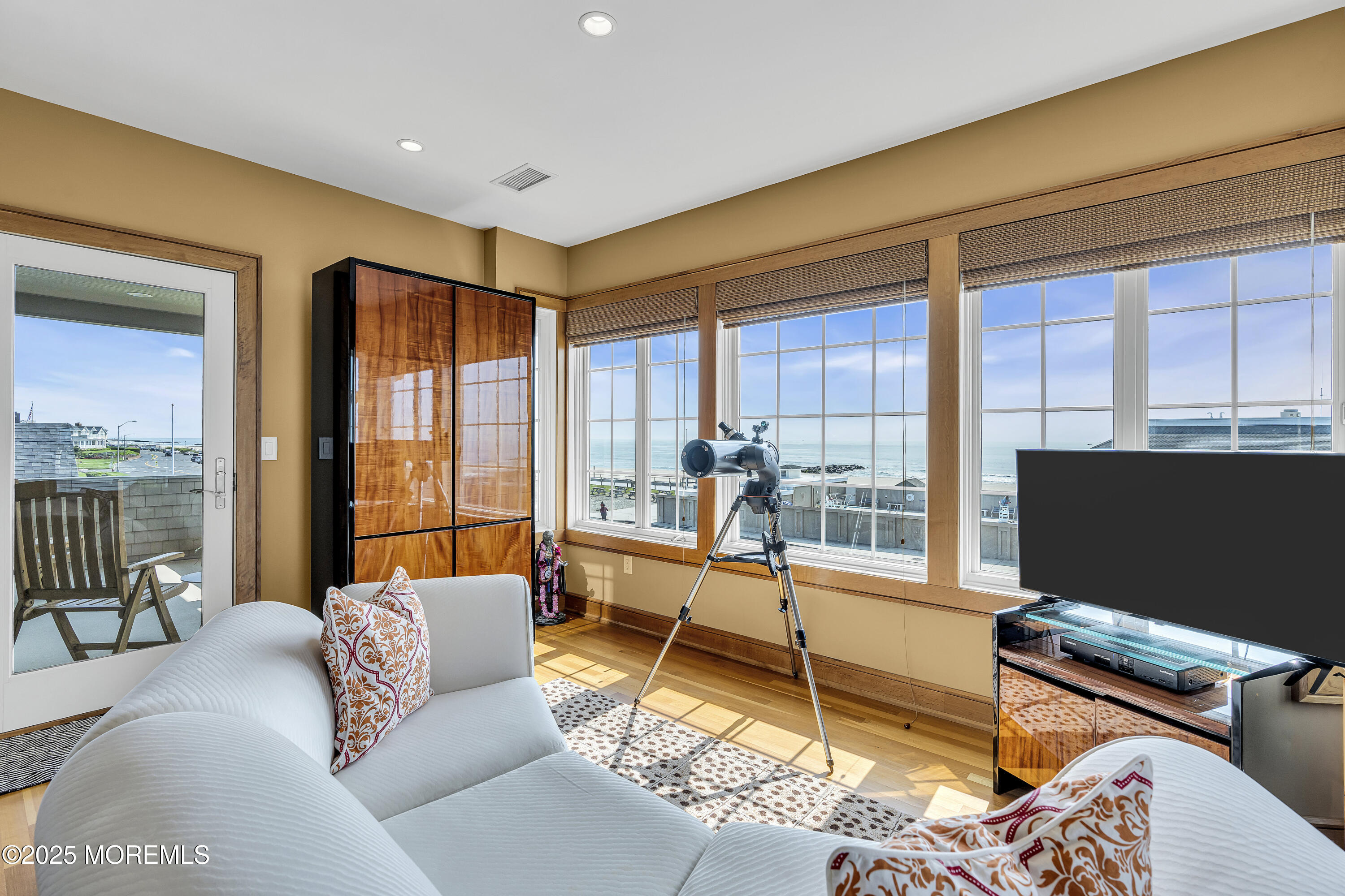 2009 North Ocean Avenue Spring Lake, NJ 07762 - Photo 44 of 91 a living room with furniture city view and large windows