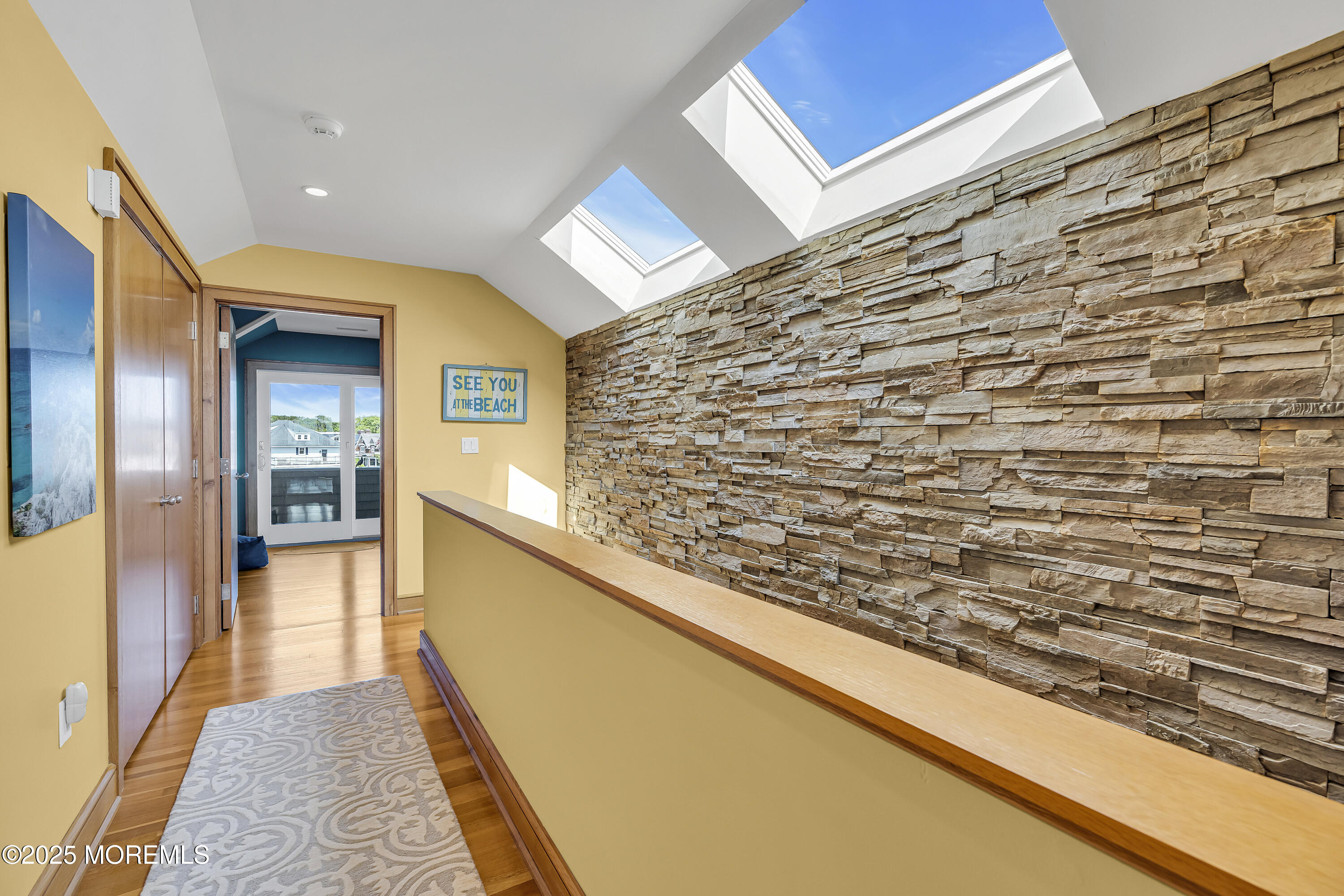 2009 North Ocean Avenue Spring Lake, NJ 07762 - Photo 66 of 91 a hallway with a wooden floor