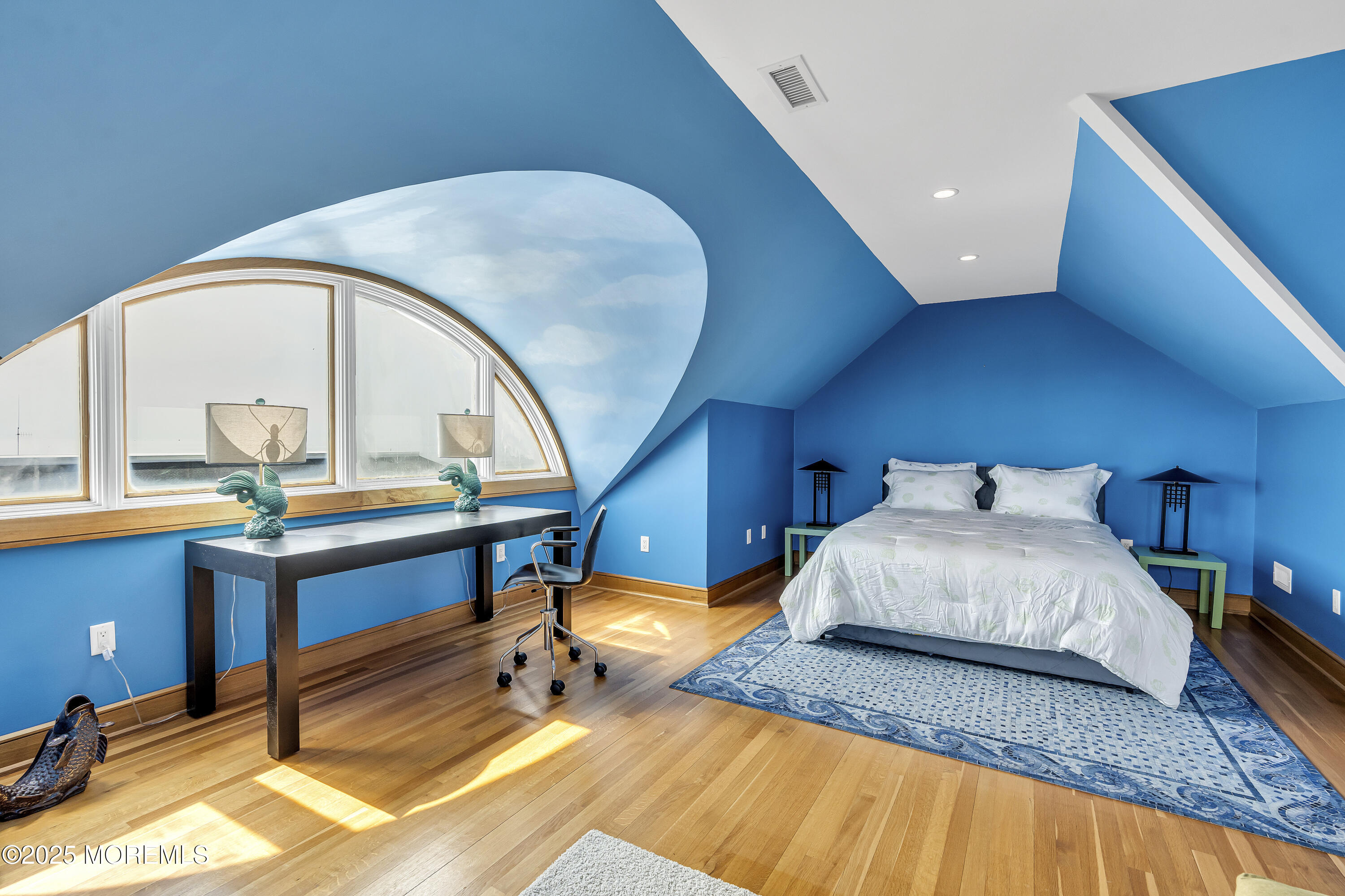 2009 North Ocean Avenue Spring Lake, NJ 07762 - Photo 7 of 91 a bedroom with a bed and a potted plant on dresser