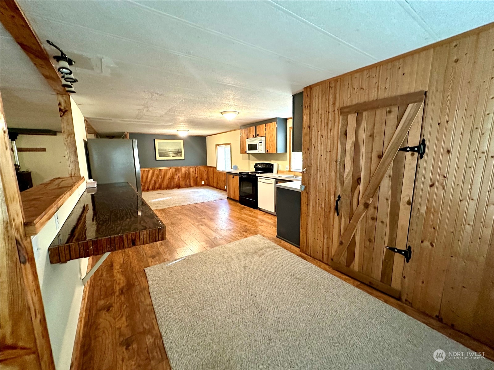 230 Salmon Drive Forks, WA 98331 - Photo 11 of 35 a bed room with a bed and furniture