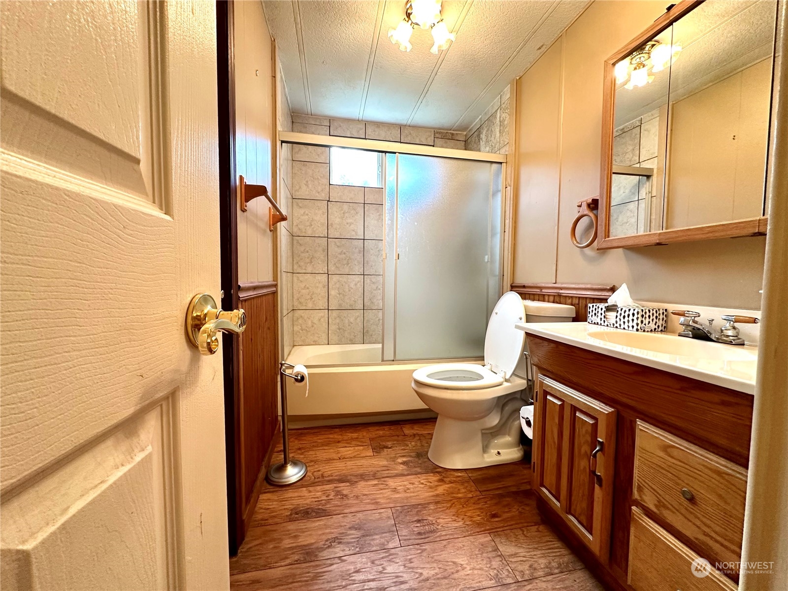 230 Salmon Drive Forks, WA 98331 - Photo 26 of 35 a bathroom with a toilet sink and mirror