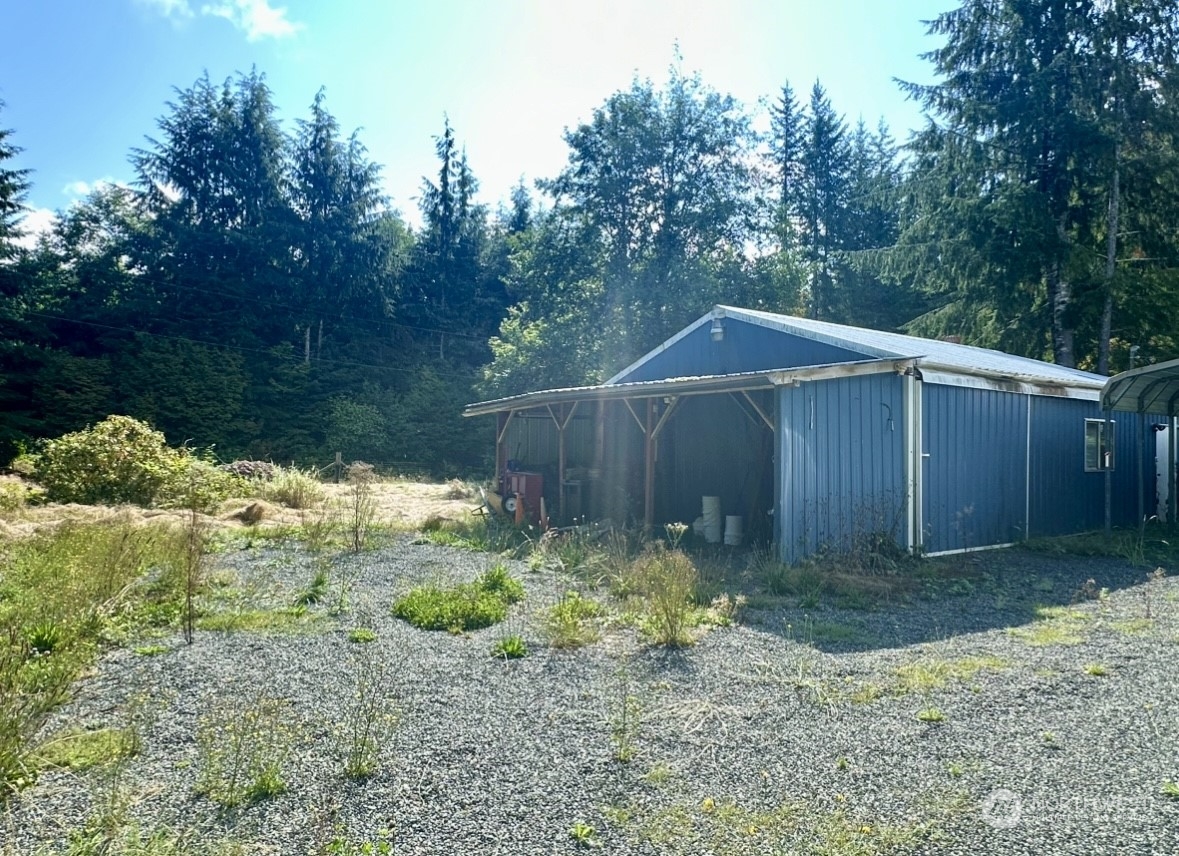 230 Salmon Drive Forks, WA 98331 - Photo 31 of 35 a backyard of a house with lots of green space