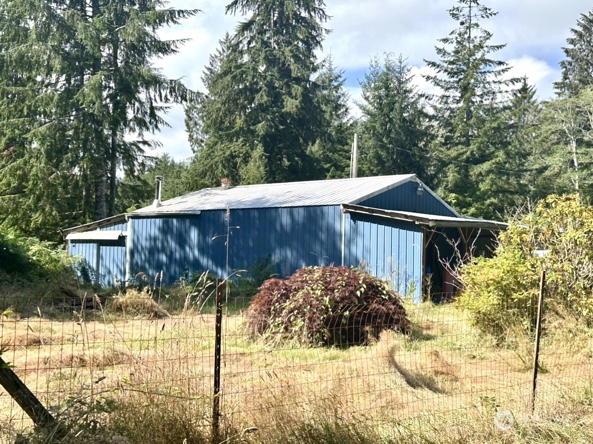 230 Salmon Drive Forks, WA 98331 - Photo 32 of 35 a view of backyard and wooden fence