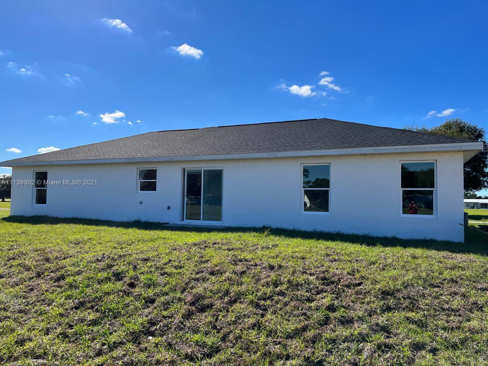 417 Cherry Tree Drive Sebring, FL 33876 - Photo 39 of 39 a view of a yard