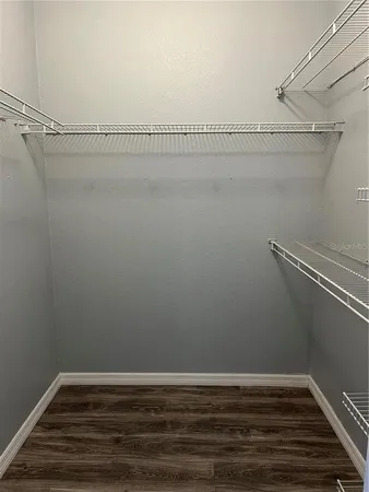 a view of a room with racks on the wall