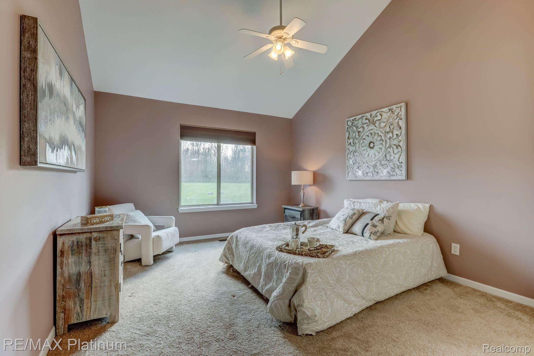 4689 Summer Ridge Drive Howell, MI 48843 - Photo 13 of 32 First floor primary bedroom.