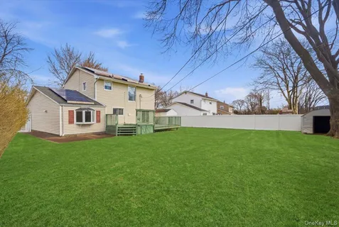 a view of a yard in front of a house