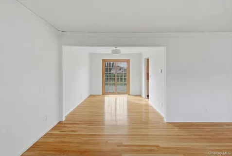 a view of an empty room and window