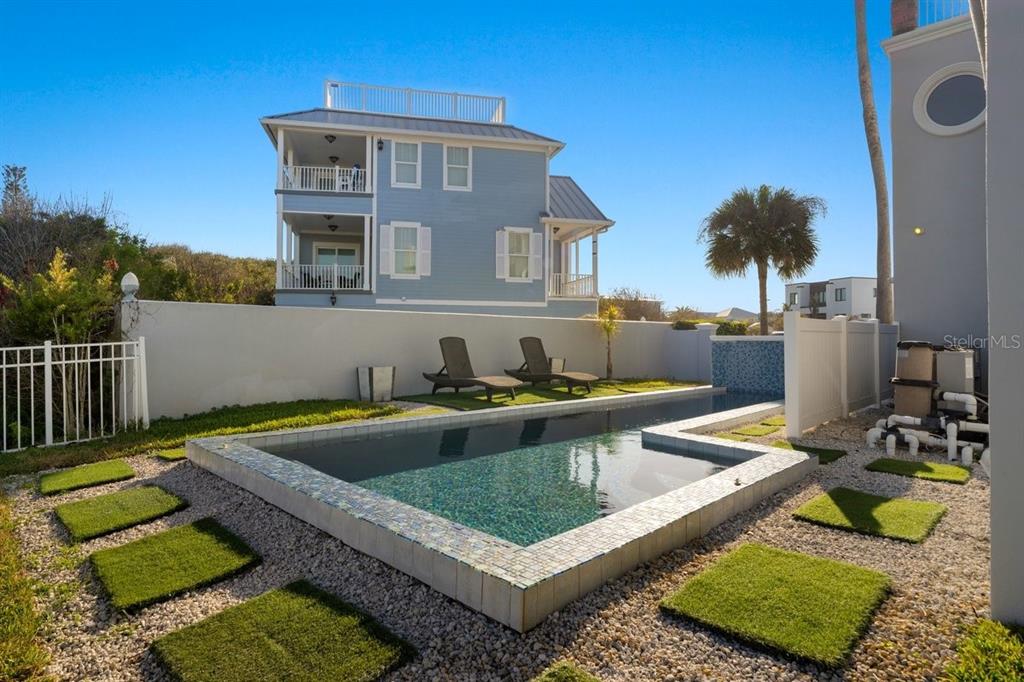 2 Mar Azul North Ponce Inlet, FL 32127 - Photo 87 of 98 a view of a house with swimming pool and sitting area