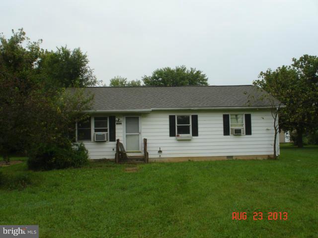 5153 Tabler Station Road Inwood, WV 25428 - Photo 1 of 1 a front view of house with yard