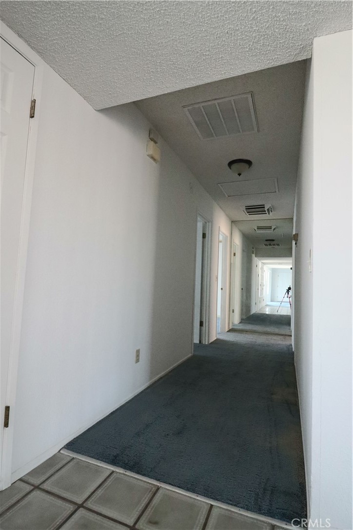 4752 Flying H Road Twentynine Palms, CA 92277 - Photo 25 of 55 a view of a hallway