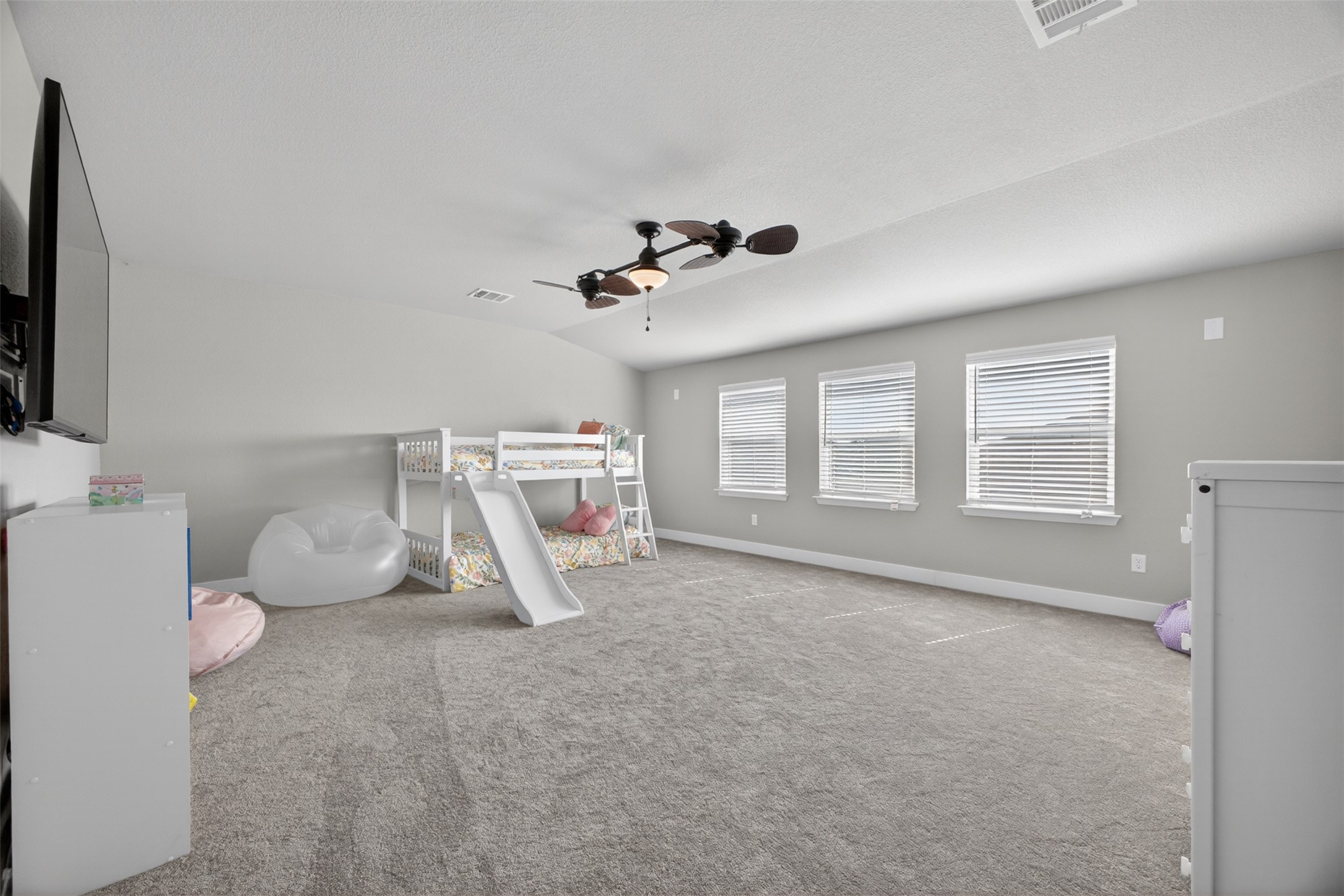 1009 Bright Star Cove Georgetown, TX 78628 - Photo 24 of 40 a view of a room with wooden floor and windows
