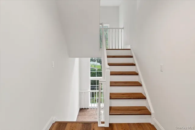 a view of entryway with wooden floor