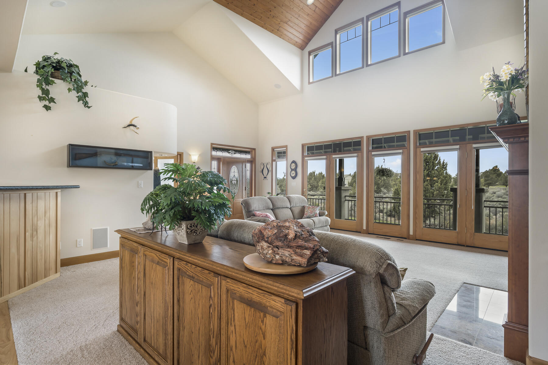 60850 Jennings Road Bend, OR 97702 - Photo 9 of 52 a living room with furniture and potted plants