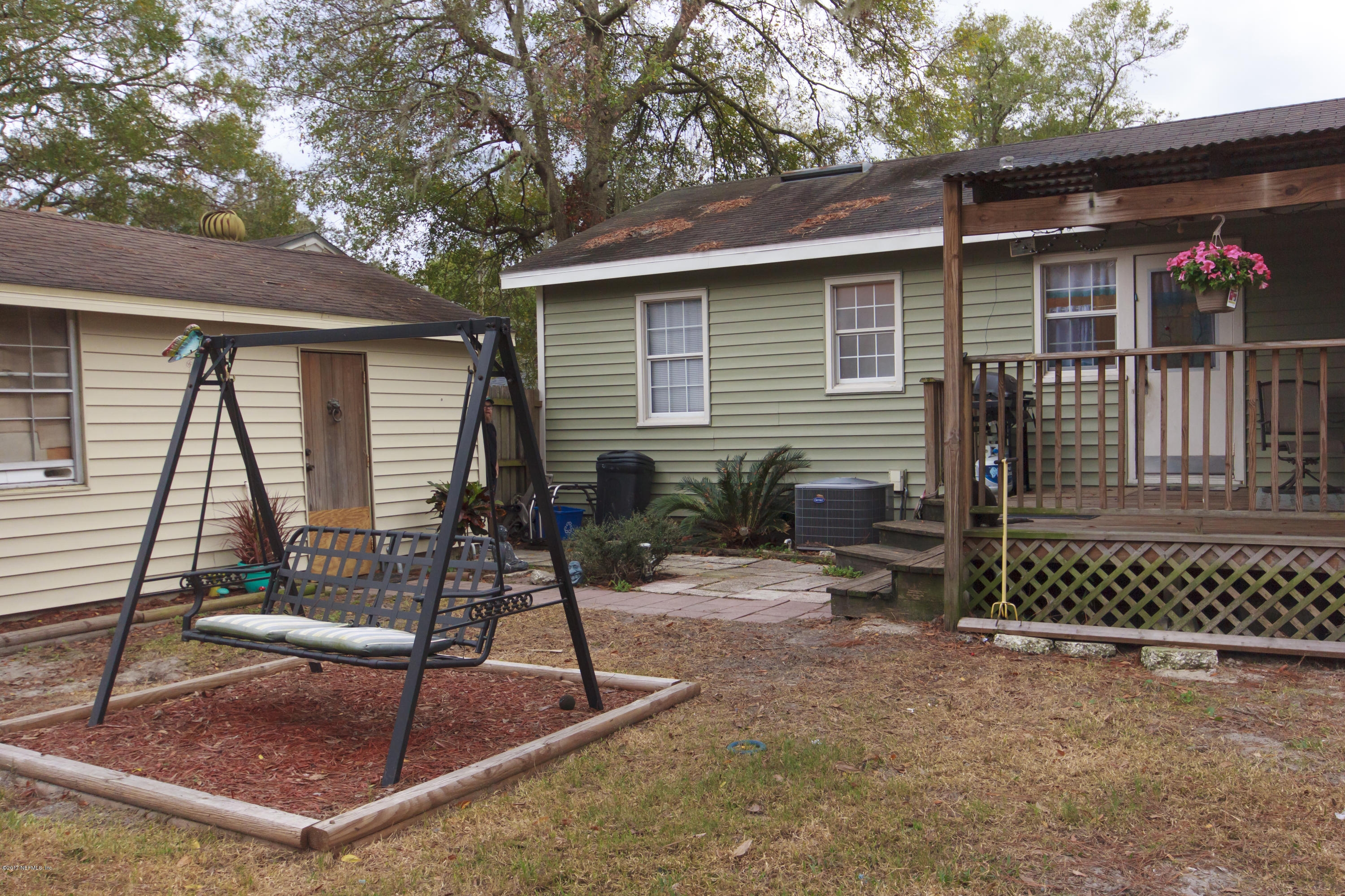4923 Dundee Road Jacksonville, FL 32210 - Photo 13 of 14 a view of house with a patio