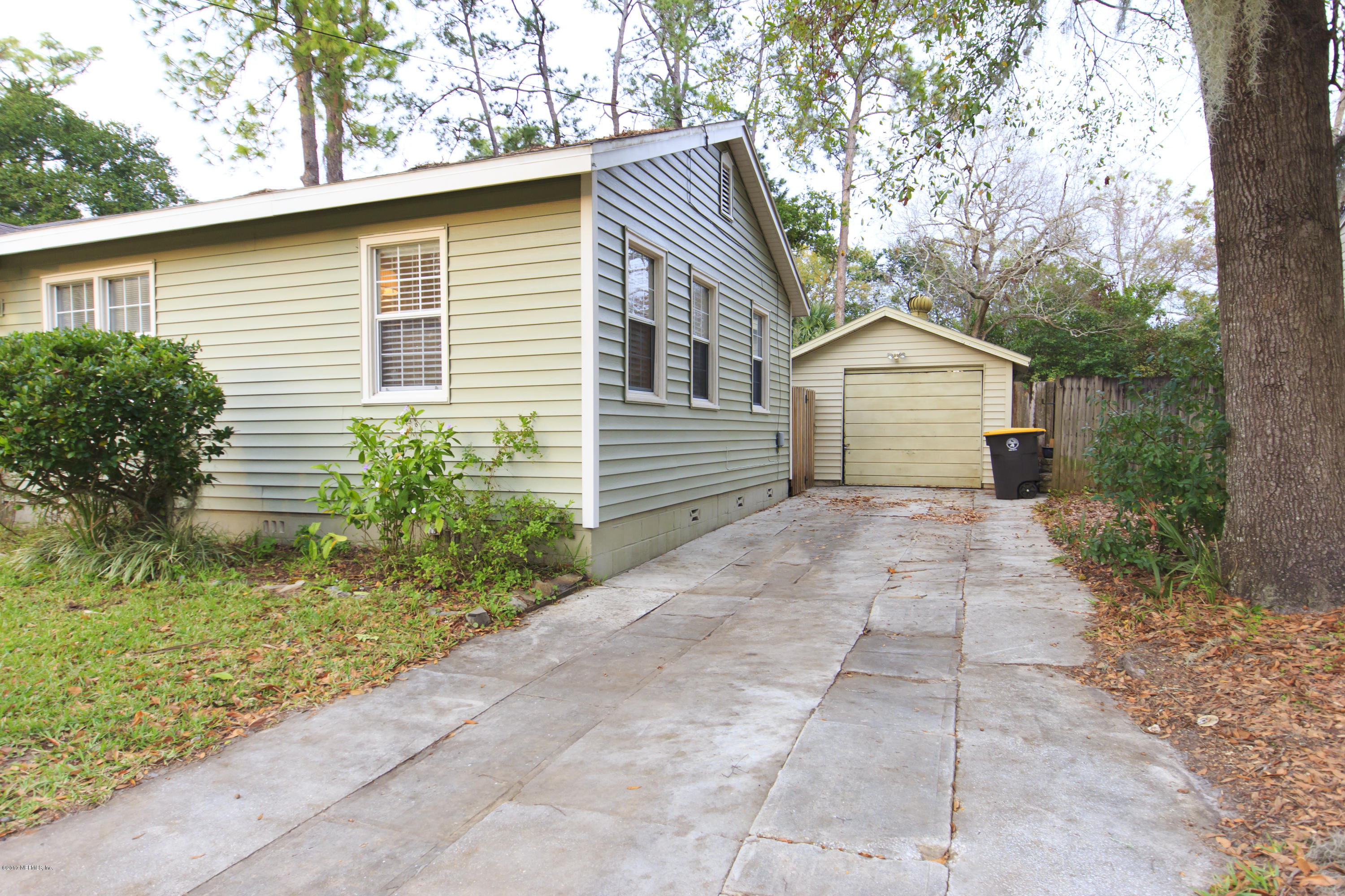 4923 Dundee Road Jacksonville, FL 32210 - Photo 14 of 14 a view of a house with a yard