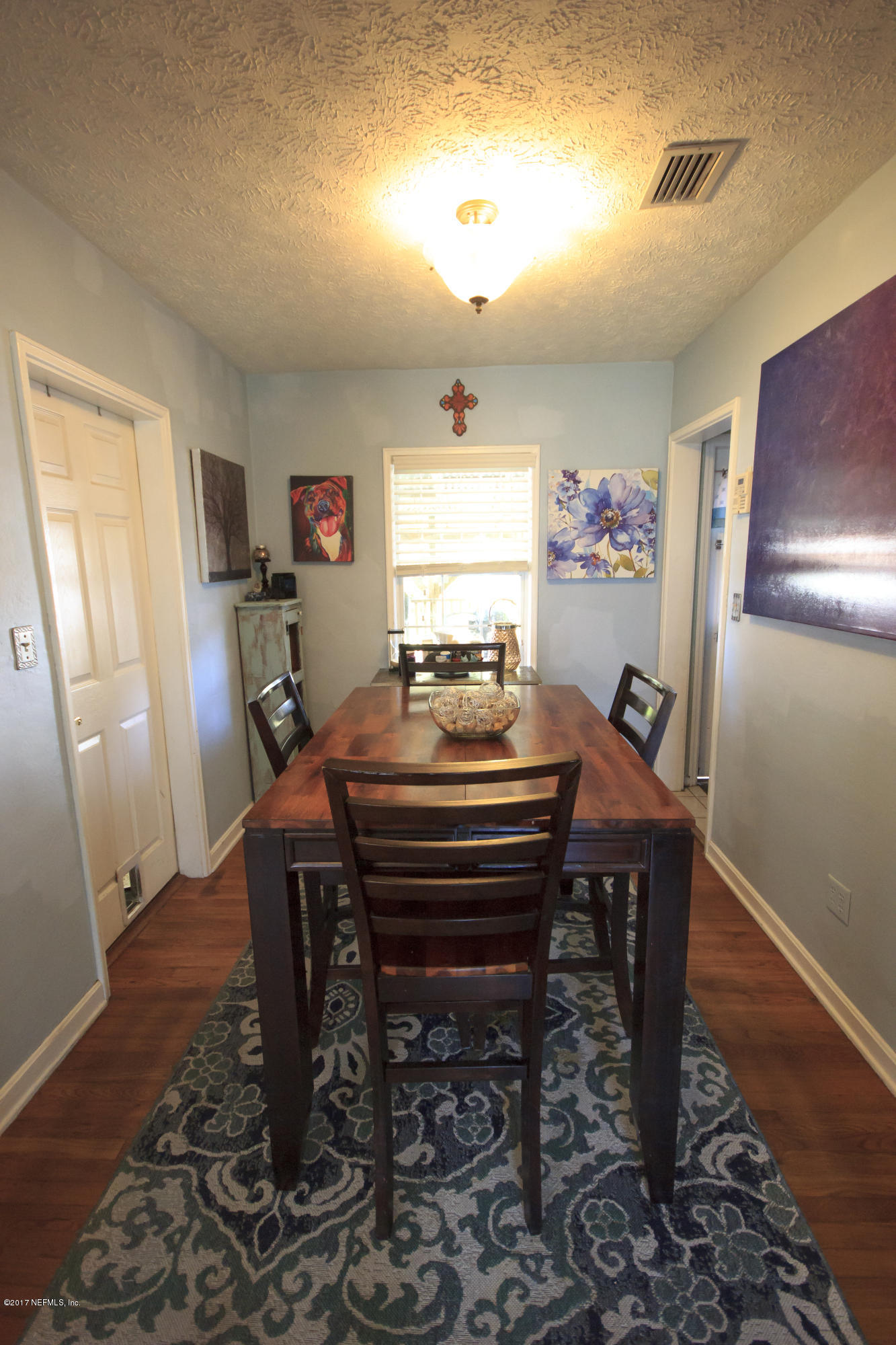 4923 Dundee Road Jacksonville, FL 32210 - Photo 5 of 14 a room with furniture and a window