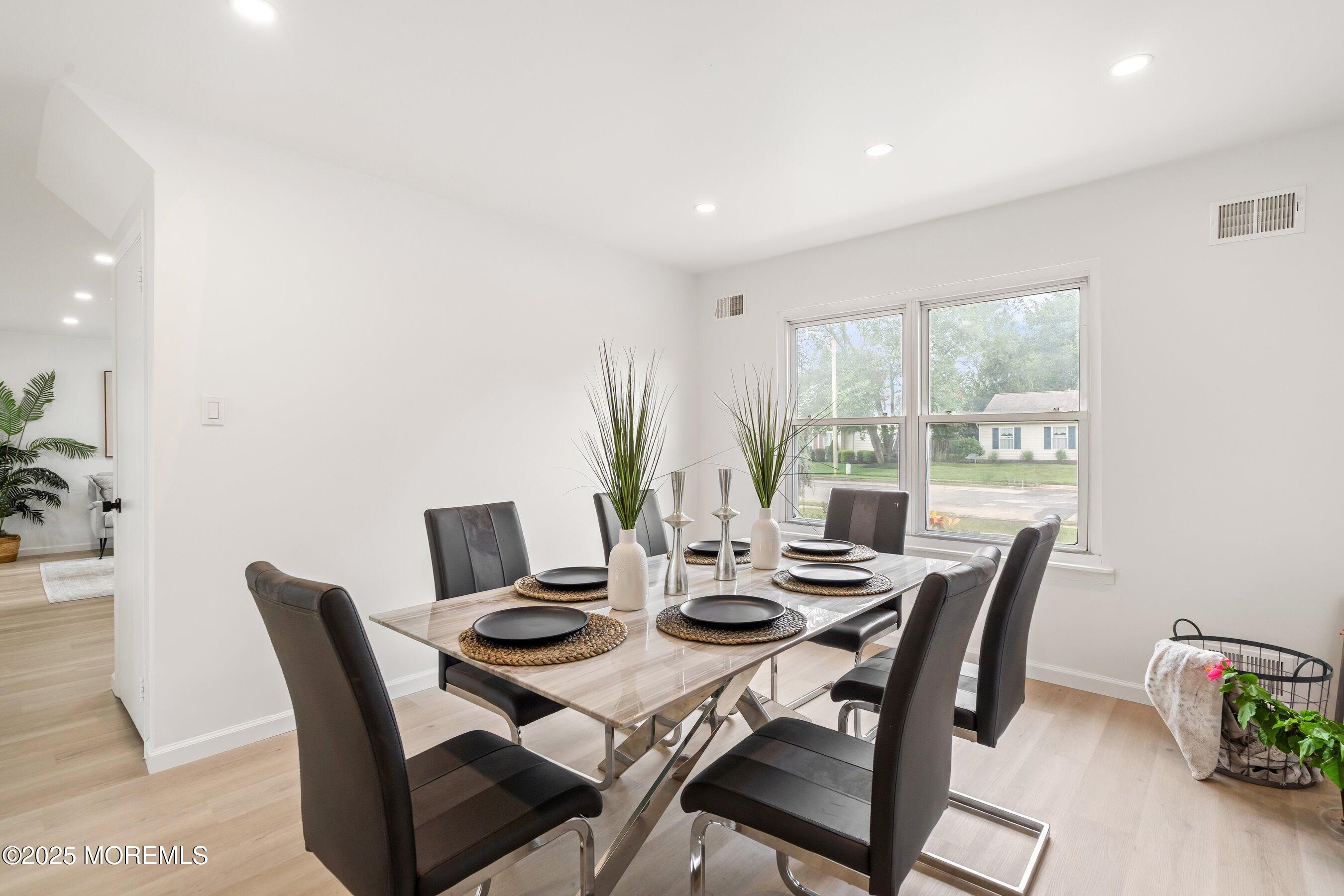 944 Yellowbank Road Toms River, NJ 08753 - Photo 13 of 33 a view of a dining room with furniture window and outside view