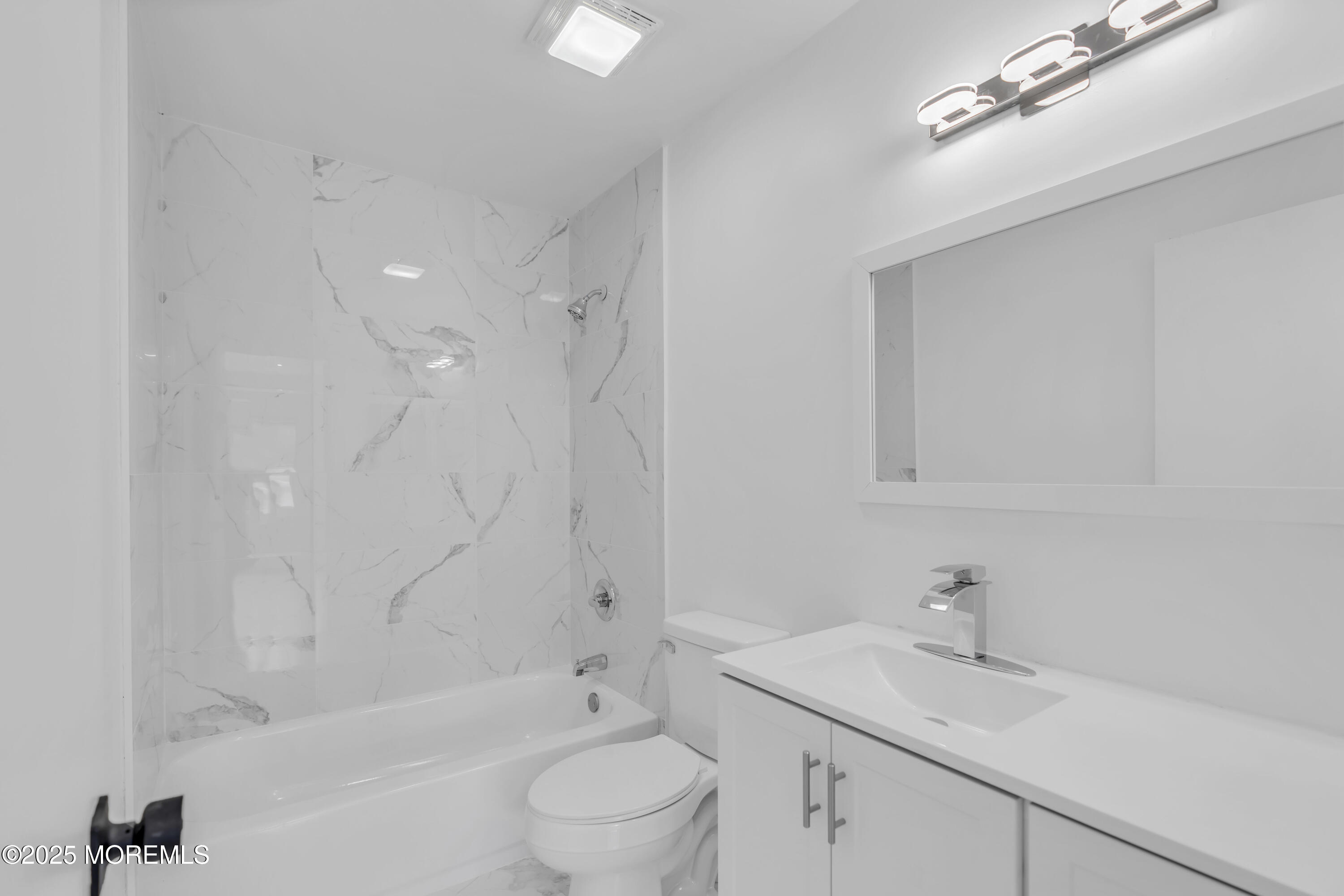 944 Yellowbank Road Toms River, NJ 08753 - Photo 19 of 33 a bathroom with a sink a toilet and shower