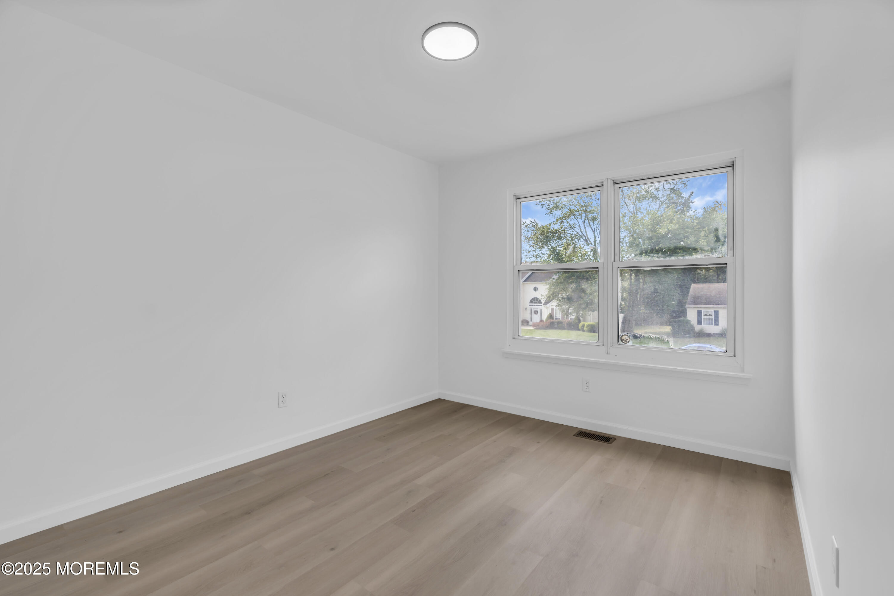 944 Yellowbank Road Toms River, NJ 08753 - Photo 21 of 33 an empty room with a window