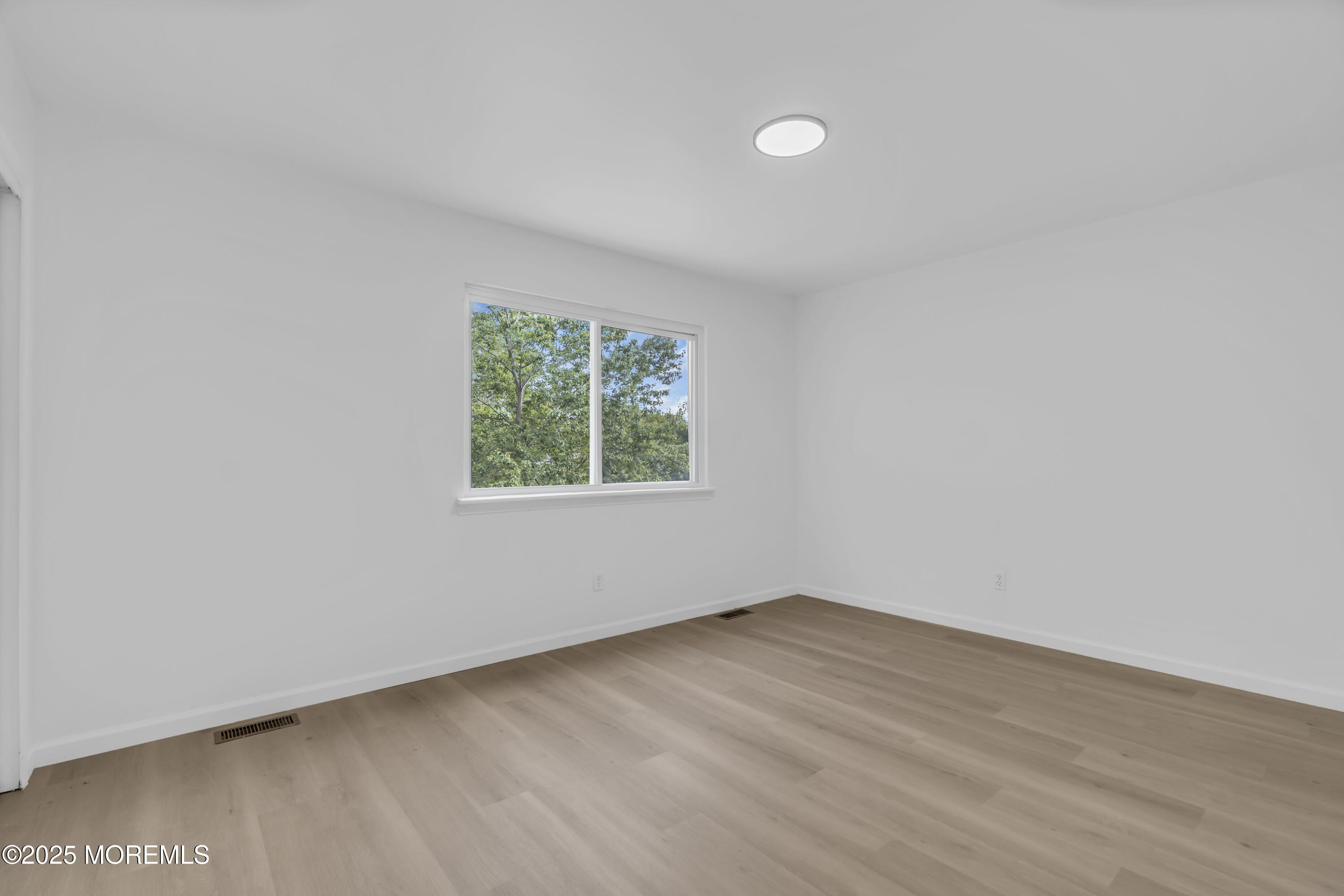 944 Yellowbank Road Toms River, NJ 08753 - Photo 25 of 33 an empty room with a window