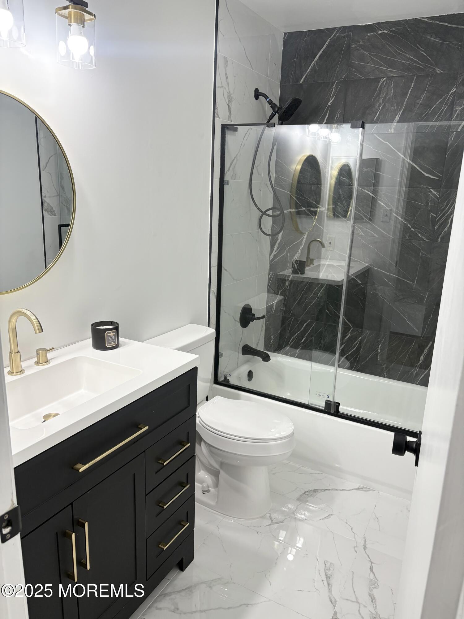 944 Yellowbank Road Toms River, NJ 08753 - Photo 28 of 33 a bathroom with a sink toilet and shower