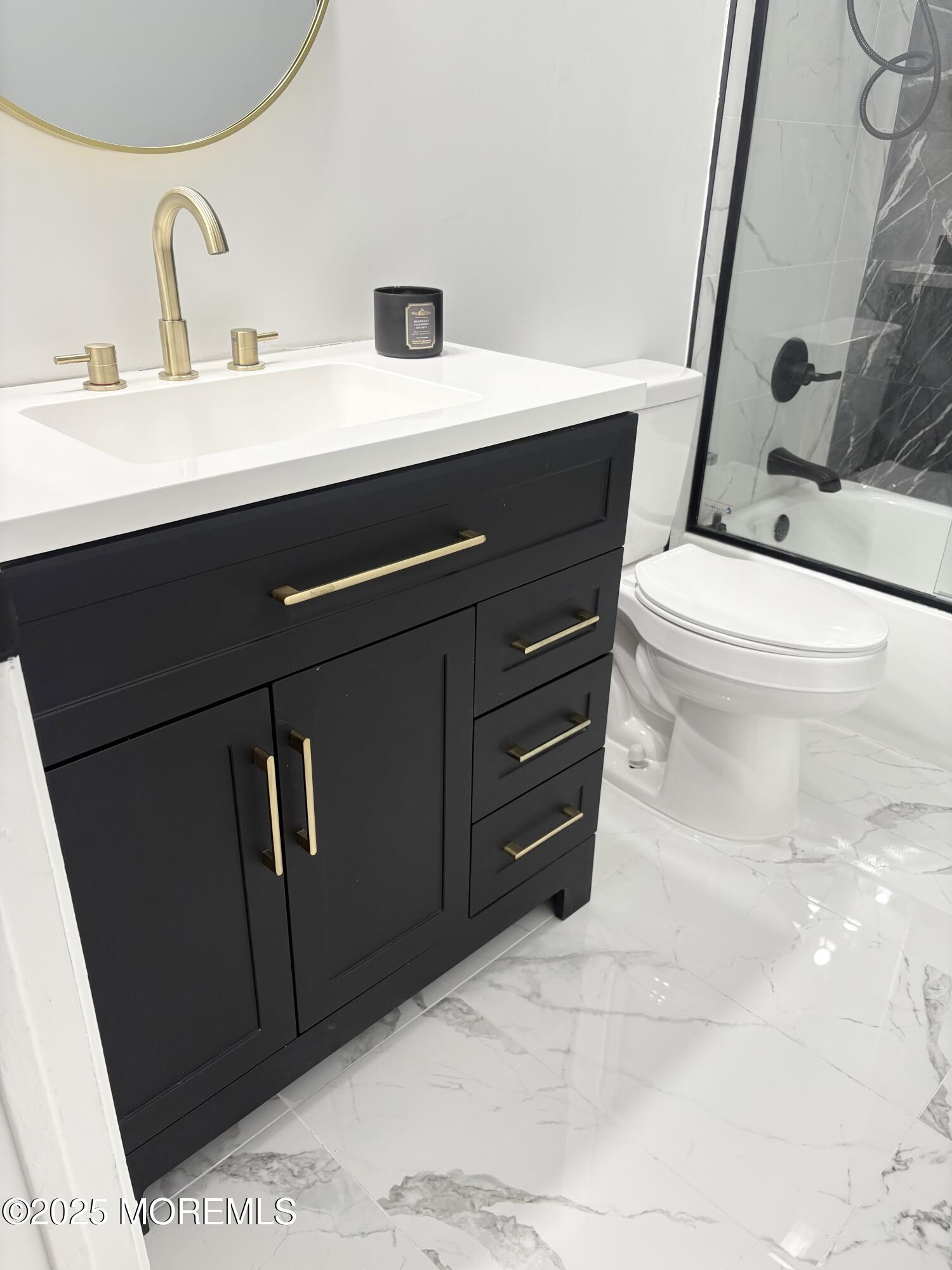 944 Yellowbank Road Toms River, NJ 08753 - Photo 29 of 33 a bathroom with a sink toilet and mirror