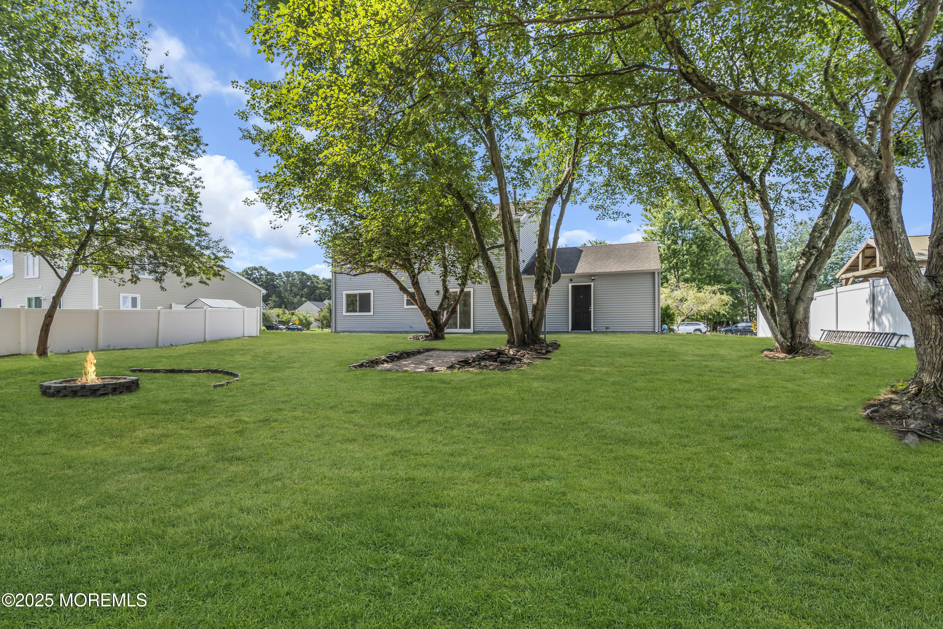 944 Yellowbank Road Toms River, NJ 08753 - Photo 32 of 33 a view of a house with a backyard