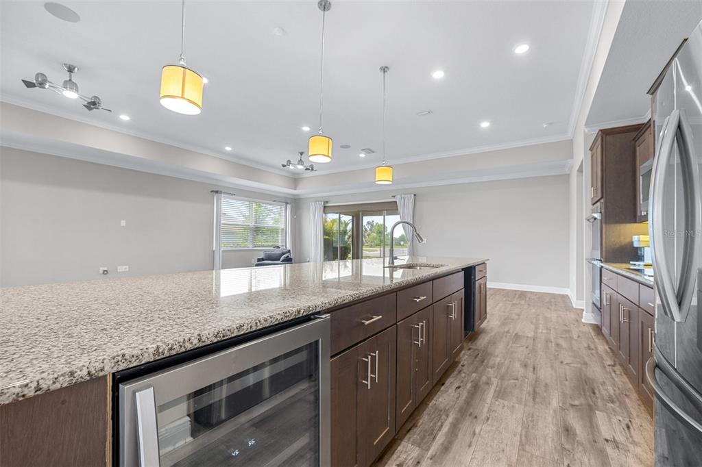 2005 149th Place East Parrish, FL 34219 - Photo 16 of 39 a large kitchen with stainless steel appliances granite countertop a large counter top