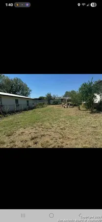 a view of ocean from a yard