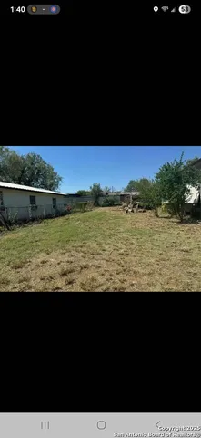 a view of ocean from a yard
