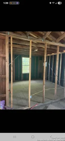 a view of backyard with glass door