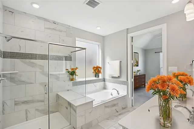 a bathroom with a double vanity sink and a mirror
