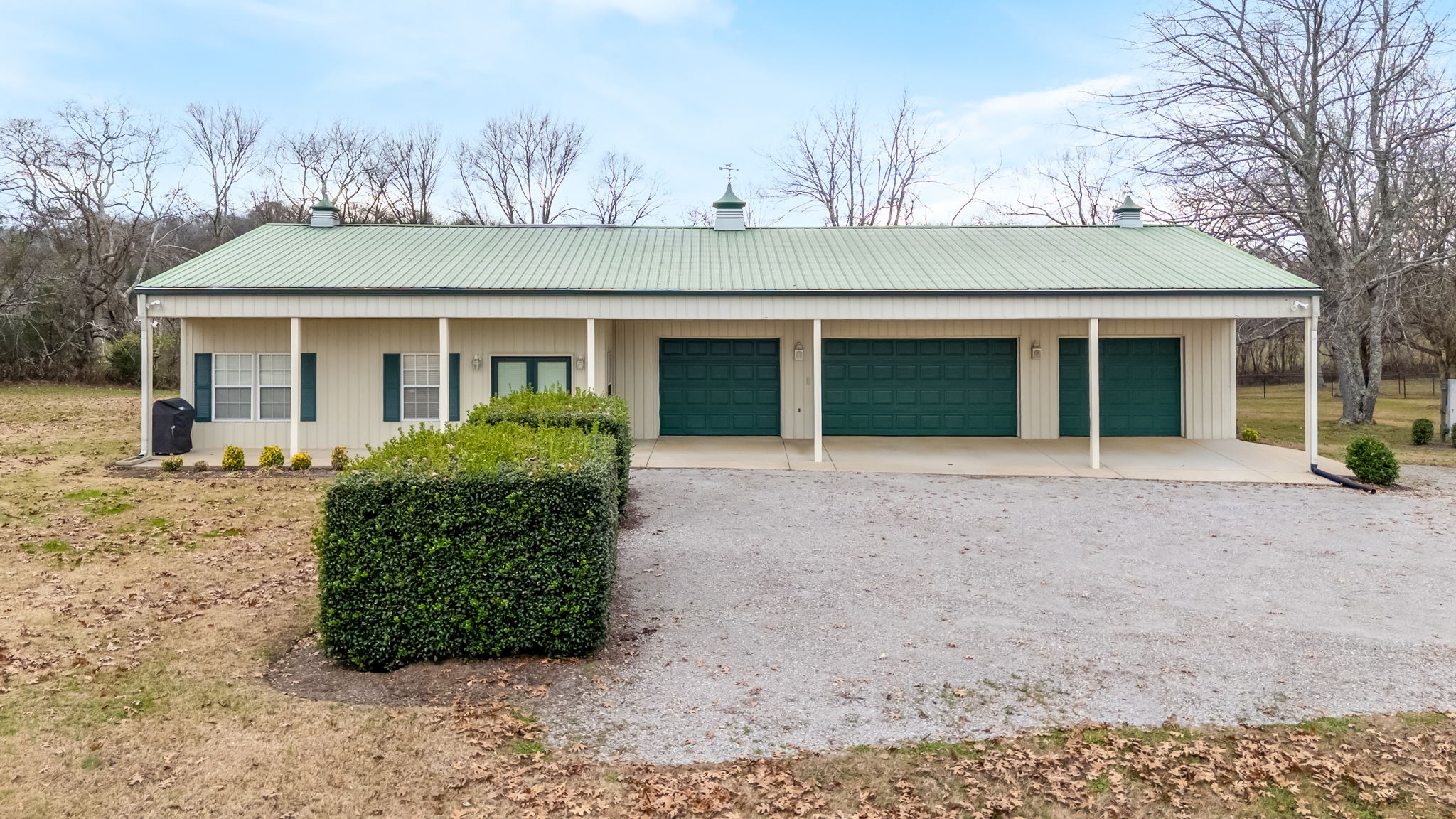 3100 Floyd Road Eagleville, TN 37060 - Photo 11 of 63 front view of a house with a garden