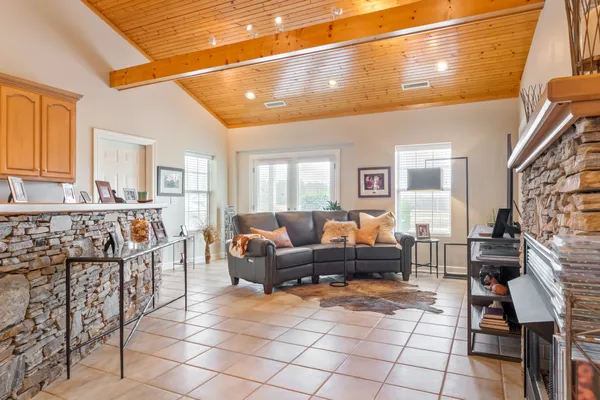 a kitchen with a sink cabinets and window