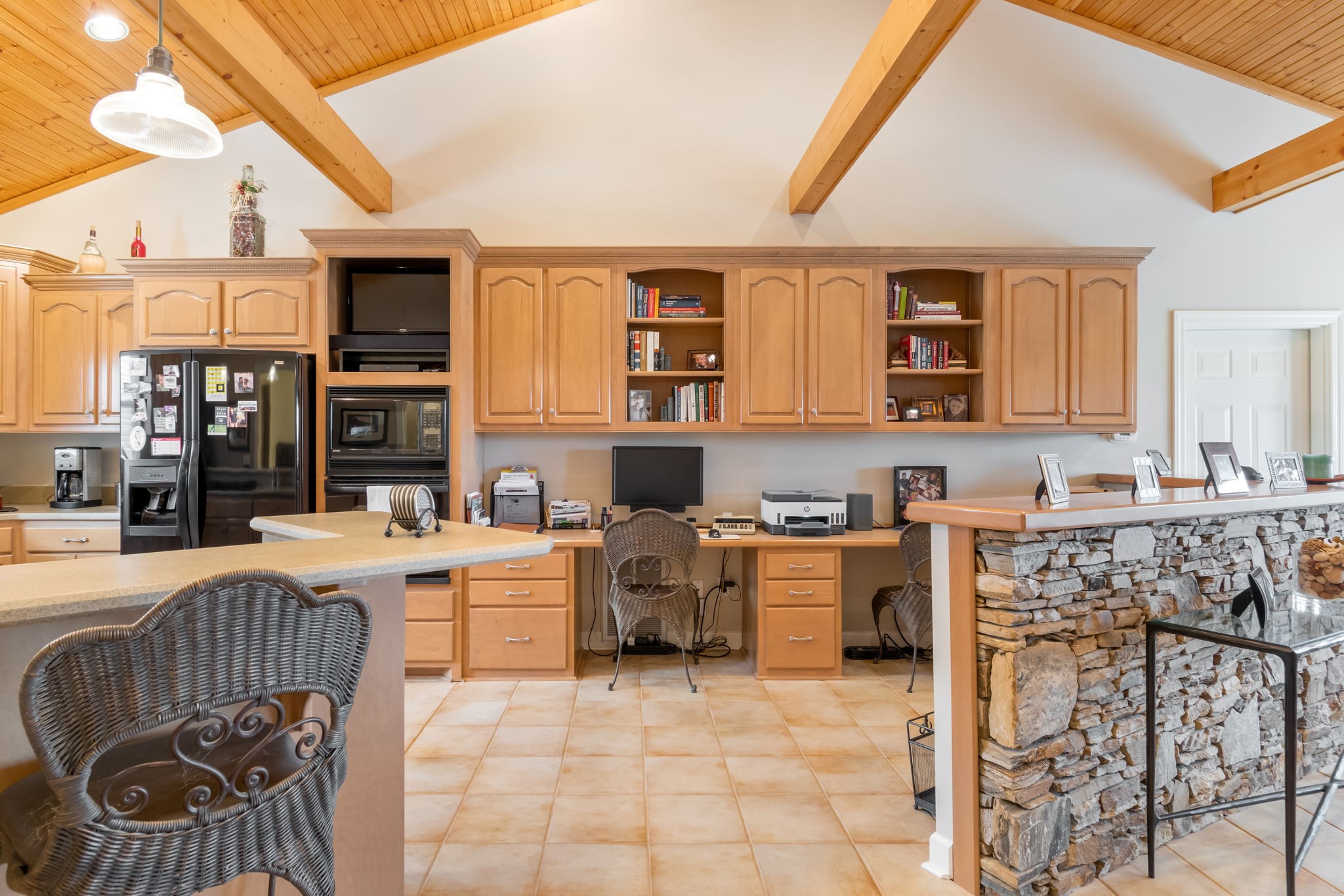 3100 Floyd Road Eagleville, TN 37060 - Photo 42 of 63 a kitchen with stainless steel appliances kitchen island granite countertop a refrigerator and cabinets