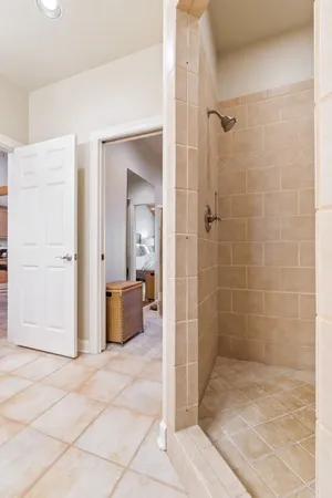 a view of backyard with large trees